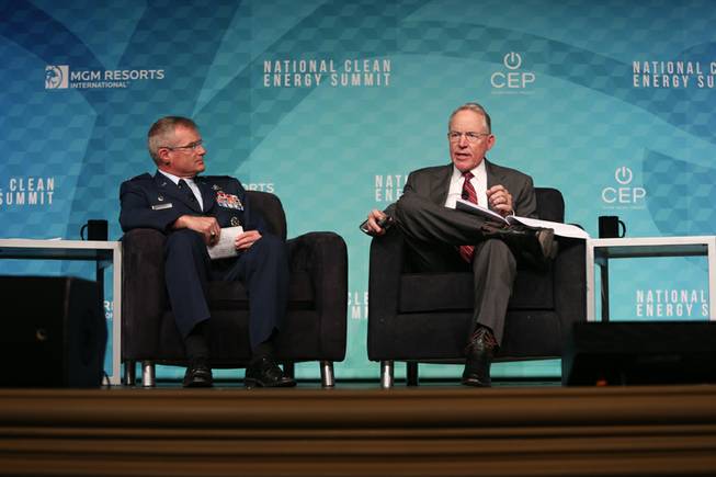 Right, NV Energy CEO Paul Caudill speaks with Nellis Air Force Base's Director of Community Partnerships Victor Rodriguez during a panel titled Utilities and Base Partnerships to Develop Clean Energy at the National Clean Energy Summit 9.0 at the Bellagio Resort and Casino on October 13, 2017.