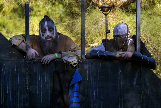 Barbarian clansmen guard the wall of their structure during the Age of Chivalry Renaissance Festival at Sunset Park on Saturday, October 14, 2017.