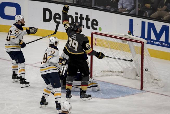 Vegas Golden Knights right wing Alex Tuch (89) celebrates a goal over the Buffalo Sabres goalie Chad Johnson (31) during their game at the T-Mobile Arena on Tuesday, Oct. 17, 2017.