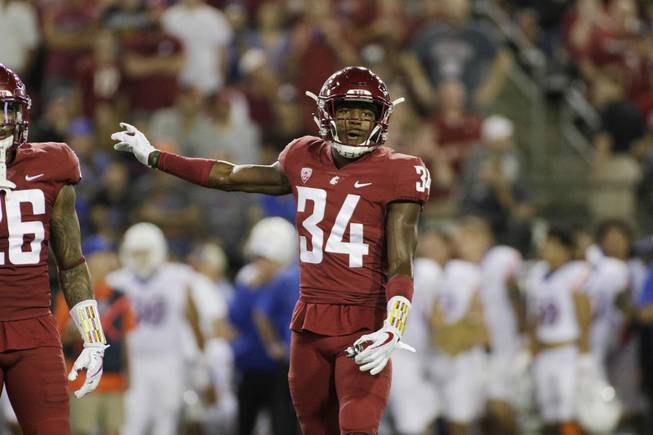 Washington State safety Jalen Thompson (34) stands on the field during the first half of an NCAA college football game against Boise State in Pullman, Wash., Saturday, Sept. 9, 2017. 