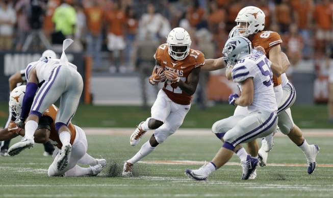 Texas wide receiver Reggie Hemphill-Mapps (17) runs against Kansas State during the first half of an NCAA college football game, Saturday, Oct. 7, 2017, in Austin, Texas. 