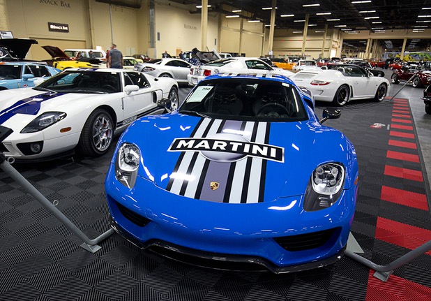 A 2015 Porsche 918 Spyder in rare Voodoo Blue is displayed before the 10th annual Barrett-Jackson Las Vegas classic car auction at the Mandalay Bay Convention Center Wednesday, Oct. 18, 2017. The car is the only 2015 918 Spyder factory produced in Voodoo Blue, according to records.
