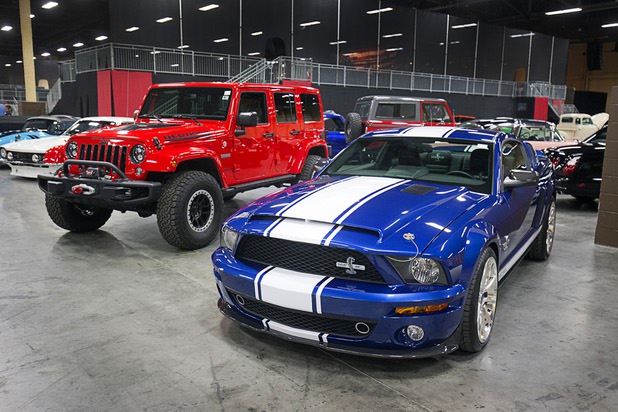 A 2016 Red Rock Edition Jeep and a 2007 Shelby Super Snake are displayed before the 10th annual Barrett-Jackson Las Vegas classic car auction at the Mandalay Bay Convention Center Wednesday, Oct. 18, 2017.  Proceeds from the Jeep, donated by Mike Helton, vice chairman of NASCAR, will go to a fund that will benefit the UNLV School of Medicine Department of Medicine Residency Program Fund. Proceeds from the Shelby, donated by Barrett-Jackson president Steve Davis, will benefit the Las Vegas Injured Police Officers Fund.