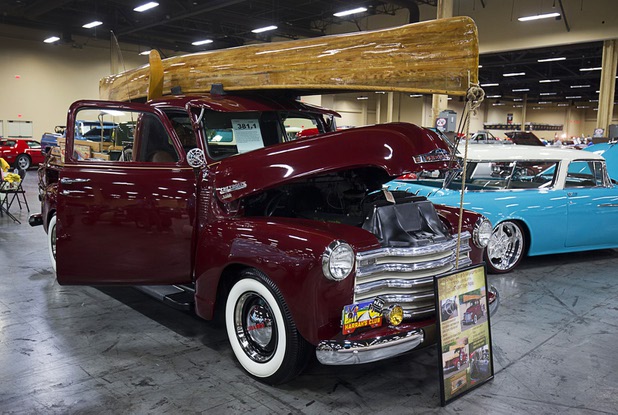 A 1950 Chevrolet 3100 pickup is displayed before the 10th annual Barrett-Jackson Las Vegas classic car auction at the Mandalay Bay Convention Center Wednesday, Oct. 18, 2017. The hand-built, cedar-strip canoe comes with the truck.