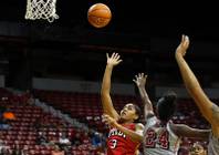 Paris Strawther puts up the ball against Rodjanae Wade during the UNLV basketball Scarlet & Gray Showcase at the Thomas & Mack Center in Las Vegas Wednesday, Oct. 18, 2017.