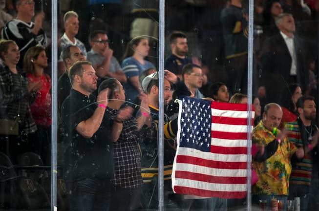 Vegas Golden Knights fans stand for pre-game activities before their game versus the Buffalo Sabres at the T-Mobile Arena on Tuesday, Oct. 17, 2017.