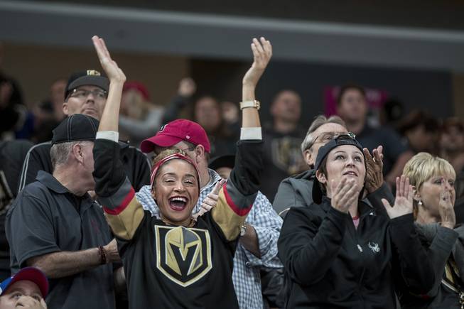 The Vegas Golden Knights fans celebrate a goal over the Buffalo Sabres during their game at the T-Mobile Arena on Tuesday, Oct. 17, 2017.