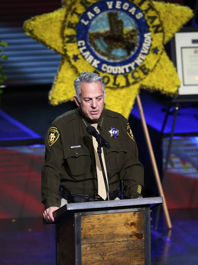 Sheriff Joseph Lombardo of the Las Vegas Police Department speaks during a funeral for Las Vegas Police Officer Charleston Hartfield, Friday, Oct. 20, 2017, in Henderson, Nev. Hartfield was killed by a gunman shooting from a hotel into a crowded outdoor concert on Oct. 1 in Las Vegas. (Chase Stevens /Las Vegas Review-Journal via AP, Pool)