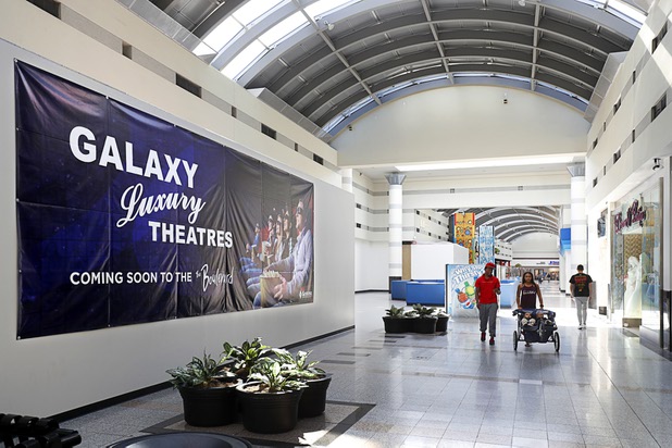 A banner announces a Galaxy Movie Theatre complex, currently under construction, in the Boulevard Mall Wednesday, Oct. 25, 2017.