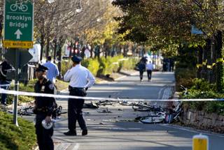 Bicycles and debris lay on a bike path after a motorist drove onto the path near the World Trade Center memorial, striking and killing several people Tuesday, Oct. 31, 2017.  