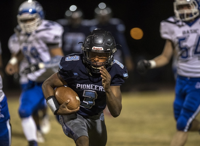 Canyon Springs' Jayvion Pugh (3) heads for the end zone ...