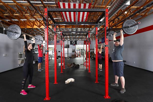 A view of the Branded One CrossFit gym, 2055 E. Windmill Lane, Monday, Nov. 6, 2017. The gym offers free membership to disabled servicemen (police, fire, military) and women. Clockwise from left: Sarah Oettining, Nick McCombs, Mara-Lee Greiner, and Bill Oettinger.