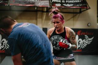 UFC fighter Gina Mazany trains during a sparring practice at Xtreme Couture MMA in Las Vegas, Nev. on October 10, 2017. She recently participated in a brain study with the Cleveland Clinic.