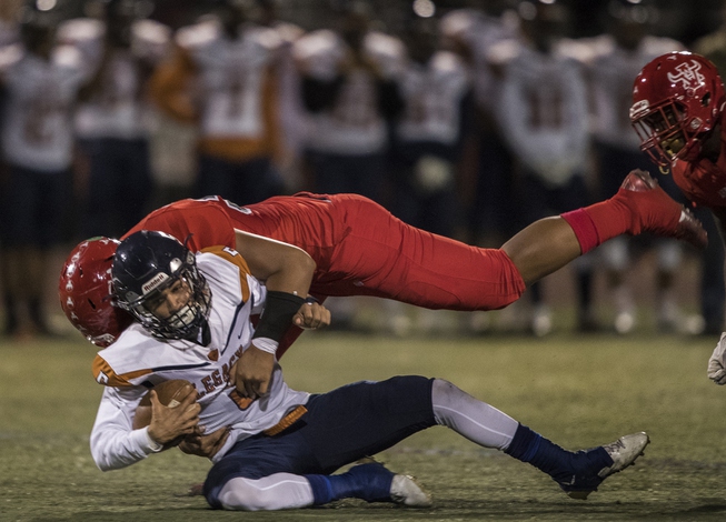 Legacy QB Roberto Valenzuela (5) is sacked by Arbor View's ...