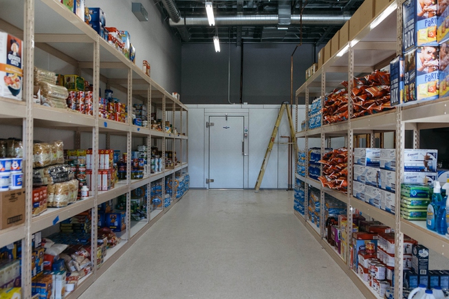 A glimpse inside the food pantry during a tour of ...