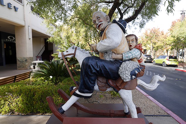 A sculpture, inspired by a Saturday Evening Post cover by Norman Rockwell, is shown in Town Square Las Vegas Monday, Nov. 13, 2017.