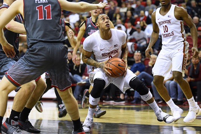 UNLV Rebels forward Anthony Smith (2) gets set to drive ...