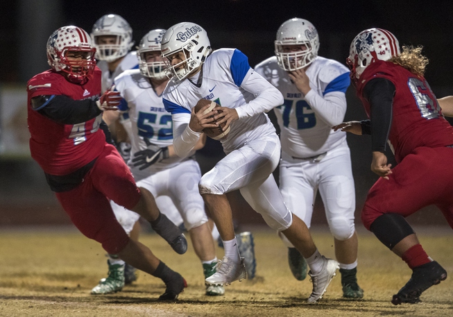 Green Valley QB A.J. Barilla (7) breaks free from the ...