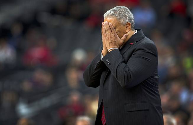UNLV head coach Marvin Menzies reacts to a Runnin' Rebels error during a game against the Rice Owls in the MGM International Main Event basketball tournament at T-Mobile Monday, Nov. 20, 2017.