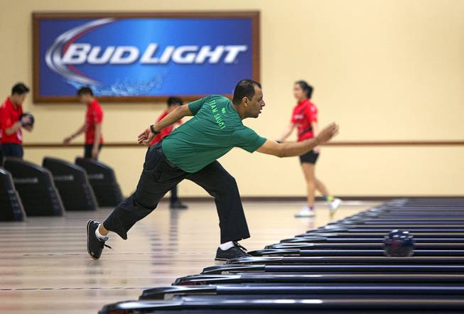 A bowler from Saudi Arabia practices for the World Bowling Championships at the South Point Bowling Plaza Wednesday, Nov. 22, 2017. The tournament runs Nov. 23 though Dec. 4 and will feature 390 bowlers from 42 countries.