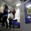 People enter a Best Buy store as it opened for a Black Friday sale on Thanksgiving Day, Thursday, Nov. 23, 2017, in Overland Park, Kan. Shoppers are hitting the stores on Thanksgiving as retailers under pressure look for ways to poach shoppers from their rivals. 

