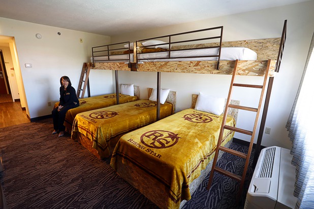 Cassandra Cousineau, director of communications and public relations, sits in a room with bunkbeds is shown at the Rising Star Sports Ranch in Mesquite, Nev. Tuesday, Nov. 28, 2017.