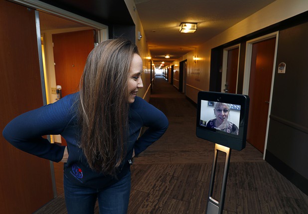 Jessica Martin, director of sports and events, interacts with Barbara Brown, surveillance manager, via a fourth floor robot at the Rising Star Sports Ranch in Mesquite, Nev. Tuesday, Nov. 28, 2017.
