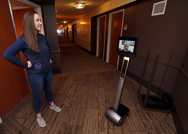 Jessica Martin, director of sports and events, interacts with Barbara Brown, surveillance manager, via a fourth floor robot at the Rising Star Sports Ranch in Mesquite, Nev. Tuesday, Nov. 28, 2017.