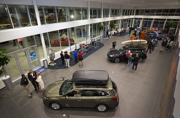 People look over the showroom during a dealership debut for Subaru owners and employees at the new Subaru Las Vegas facility, a two-story building with 65,500 sq. ft. on Roy Horn Way between Rainbow and Jones boulevards, Wednesday, Nov. 29, 2017.