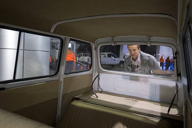 Jay Castellano looks into a vintage Subaru van during a dealership debut for Subaru owners and employees at the new Subaru Las Vegas facility, a two-story building with 65,500 sq. ft. on Roy Horn Way between Rainbow and Jones boulevards, Wednesday, Nov. 29, 2017.