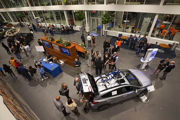 People look over the showroom during a dealership debut for Subaru owners and employees at the new Subaru Las Vegas facility, a two-story building with 65,500 sq. ft. on Roy Horn Way between Rainbow and Jones boulevards, Wednesday, Nov. 29, 2017.