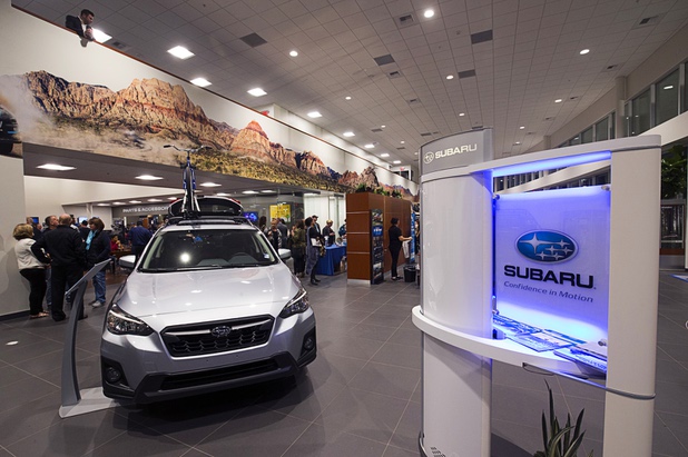 People look over the showroom during a dealership debut for Subaru owners and employees at the new Subaru Las Vegas facility, a two-story building with 65,500 sq. ft. on Roy Horn Way between Rainbow and Jones boulevards, Wednesday, Nov. 29, 2017.