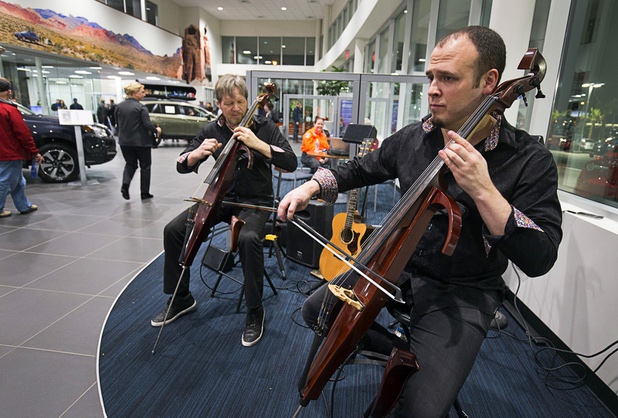 Bridge, a musical duo of Jerry Pence, left, and Mert Sermet, performs with electric cellos during a dealership debut for Subaru owners and employees at the new Subaru Las Vegas facility, a two-story building with 65,500 sq. ft. on Roy Horn Way between Rainbow and Jones boulevards, Wednesday, Nov. 29, 2017.