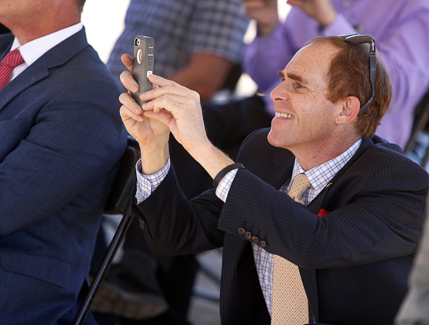 David Cherry, communications and intergovernmental relations manager for the City of Henderson, takes a photo during a groundbreaking ceremony for a $34 million Interstate-15 and Starr Avenue interchange project Thursday, Nov. 30, 2017. The interchange, part of a $1.3 billion I-15 South Corridor project, is expected to be completed in May 2019.