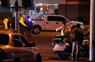 Metro Police officers investigate after a fatal auto pedestrian accident on Sahara Avenue at Sixth Street Monday, Dec. 4, 2017.