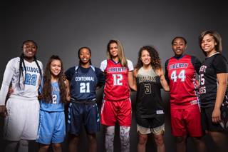 The Las Vegas Sun's Super Seven girls preseason all-city basketball team, from left, Eboni Walker, Melanie Isbell, Justice Ethridge, Rae Burrell, Essence Booker, Dre'una Edwards and Dajaah Lightfoot, take a portrait during the Las Vegas Sun's Media Day at the South Point on Nov. 14, 2017.