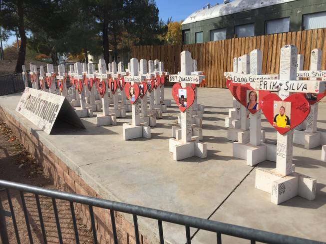 The wooden crosses, shown Dec. 2, 2017,  honoring the 58 victims of the mass shooting on the Las Vegas Strip, are displayed at the Clark County Museum.