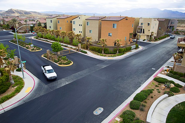 A view of a neighborhood with three-story homes in Las Vegas, April 4, 2013. Las Vegas is a lower-wage metro area that can attract people not by its economic prowess but by its supply of lower-cost housing.