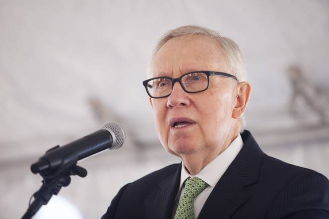 Former U.S. Senator Harry Reid speaks to the crowd during a ceremony to celebrate the commissioning of the 179 megawatt Switch Station 1 and 2 Solar Projects, Monday, Dec. 11, 2017.  This is the first-ever project to be built in one of the Bureau of Land Management's Solar Energy Zones.