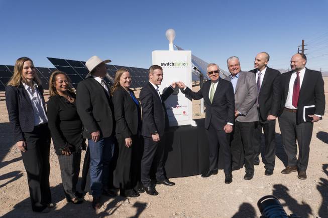 From left: Kathryn Arbeit, VP of Project Development Americas, First Solar, unknown, John Ruhs, Nevada State Director, Bureau of Land Management, Angela Dykema, Nevada Office of Energy, Cliff Graham, VP of Development U.S., EDF Renewable Energy, former U.S. Senator Harry Reid, Steve Sisolak, Chairman, Clark County Commission, Sam Castor, Executive Vice President of Policy - Switch, Dave Ulozas, Senior VP of Renewable Resources, NV Energy pose for a photo during the honorary flipping of the switch to celebrate the commissioning of the 179 megawatt Switch Station 1 and 2 Solar Projects, Monday, Dec. 11, 2017.  This is the first-ever project to be built in one of the Bureau of Land Management's Solar Energy Zones.