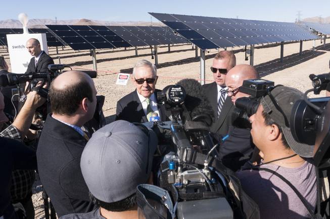 Former Senator Harry Reid talks to reporters following a ceremony to celebrate the commissioning of the 179 megawatt Switch Station 1 and 2 Solar Projects, Monday, Dec. 11, 2017.  This is the first-ever project to be built in one of the Bureau of Land Management's Solar Energy Zones.