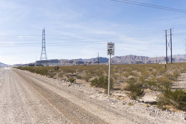 A peculiar speed limit sign of 10 and a half miles per hour designates the speed on the road leading up to the Switch Solar Plant during a ceremony to celebrate the commissioning of the 179 megawatt Switch Station 1 and 2 Solar Projects, Monday, Dec. 11, 2017.  This is the first-ever project to be built in one of the Bureau of Land Management's Solar Energy Zones.