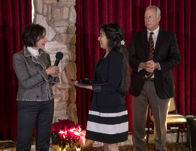 Myra Greenspun has a question for Manushri Desai of Ed. W. Clark High School with Brian Greenspun listening to the conversation during the Las Vegas Sun Youth Forum luncheon on Tuesday, Dec. 12, 2017. The Event honors the 28 student representatives selected at the 2017 Las Vegas Sun Youth Forum at the Las Vegas Country Club.