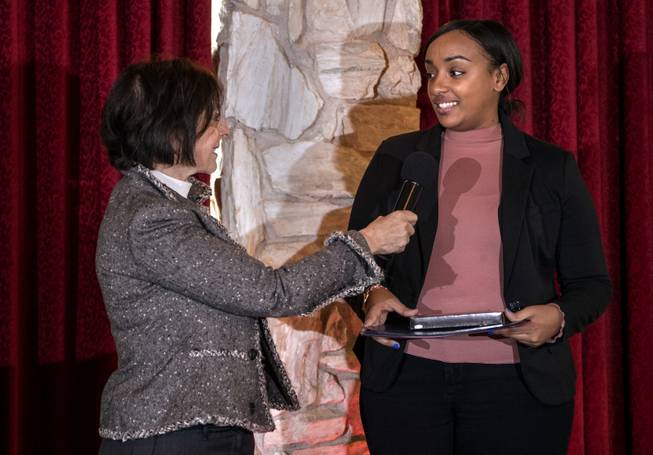 Myra Greenspun looks to Shalom Wundimu of Valley High School as she answers a question during the Las Vegas Sun Youth Forum luncheon on Tuesday, Dec. 12, 2017. The Event honors the 28 student representatives selected at the 2017 Las Vegas Sun Youth Forum at the Las Vegas Country Club.