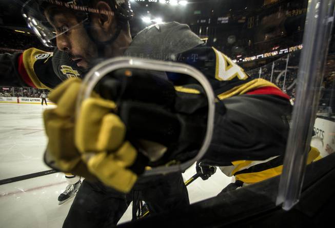 Vegas Golden Knights left wing Pierre-Edouard Bellemare (41) works the glass versus the Pittsburgh Penguins during their game at the T-Mobile Arena on Thursday, Dec. 14, 2017.