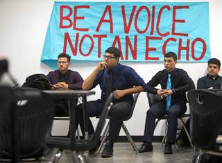 Students listen to a presentation during an AP U.S. Government at the Equipo Academy charter school Thursday, Dec. 21, 2017. The school will graduate its first class this June and is aiming to have 100% of seniors accepted to college.