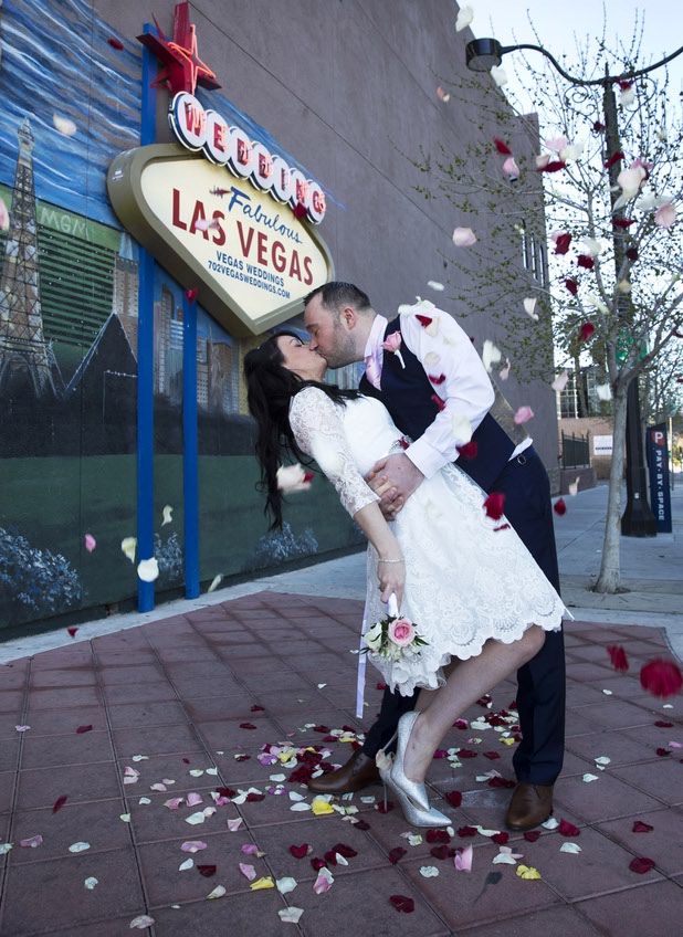 Natalie Collins and Paul Parkins of England poses for photos after getting married at Vegas Weddings in downtown Las Vegas Tuesday, Feb. 14, 2017.  .