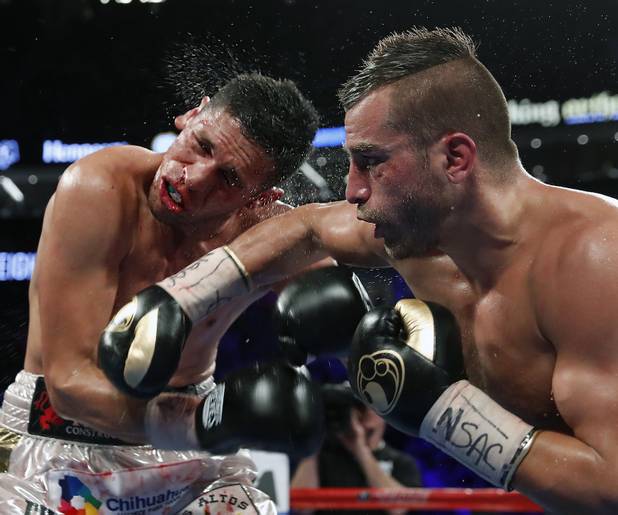 Middleweight Marcos Reyes is cracked by a hard punch by David Lemieux during their fight at the T-Mobile Arena on Saturday, May 6, 2017.