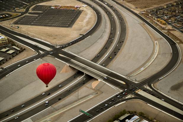 A Vegas Balloon Rides balloon flies low lover the 215 leaving from the Southern Hills Hospital in preparation for the upcoming 7th annual Balloon Festival there this weekend on Thursday, Oct. 19, 2017.