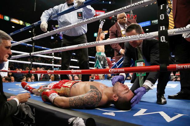 A ringside physician checks on Dejan Zlaticanin after he was knocked out by Mikey Garcia during the third round of their WBC lightweight title fight at MGM Grand Garden Arena on January 28, 2017 in Las Vegas, Nevada.